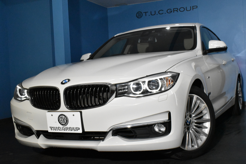 BMW 3シリーズ 320i ｸﾞﾗﾝﾂｰﾘｽﾓ ﾗｸﾞｼﾞｭｱﾘｰ  追従ACC ﾋｰﾀｰ付ﾍﾞｰｼﾞｭ革 車線逸脱&歩行者警告 衝突軽減B 電動Rｹﾞｰﾄ 電格Rｽﾎﾟｲﾗｰ ﾀｯﾁﾊﾟｯﾄﾞHDDﾅﾋﾞ Bｶﾒﾗ ﾘｱPDC ﾘﾝｸﾞ付ｷｾﾉﾝ ｽﾏｰﾄｷｰ iｽﾄｯﾌﾟ 2年保証