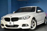 BMW 3シリーズ 320i ｸﾞﾗﾝﾂｰﾘｽﾓ Mｽﾎﾟｰﾂ 追従ACC ﾌﾙｾｸﾞTV  車線逸脱&歩行者警告 衝突軽減B 電動Rｹﾞｰﾄ 電格Rｳｲﾝｸﾞ ﾊﾟﾄﾞﾙｼﾌﾄ ｱﾙｶﾝﾀｰﾗ電動ｽﾎﾟｰﾂｼｰﾄ 18AW ﾀｯﾁﾊﾟｯﾄﾞﾅﾋﾞBｶﾒﾗ iｽﾄｯﾌﾟ ｽﾏｰﾄｷｰ2年保証