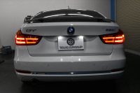 BMW 3シリーズ 320i ｸﾞﾗﾝﾂｰﾘｽﾓ ﾗｸﾞｼﾞｭｱﾘｰ  追従ACC ﾋｰﾀｰ付ﾍﾞｰｼﾞｭ革 車線逸脱&歩行者警告 衝突軽減B 電動Rｹﾞｰﾄ 電格Rｽﾎﾟｲﾗｰ ﾀｯﾁﾊﾟｯﾄﾞHDDﾅﾋﾞ Bｶﾒﾗ ﾘｱPDC ﾘﾝｸﾞ付ｷｾﾉﾝ ｽﾏｰﾄｷｰ iｽﾄｯﾌﾟ 2年保証